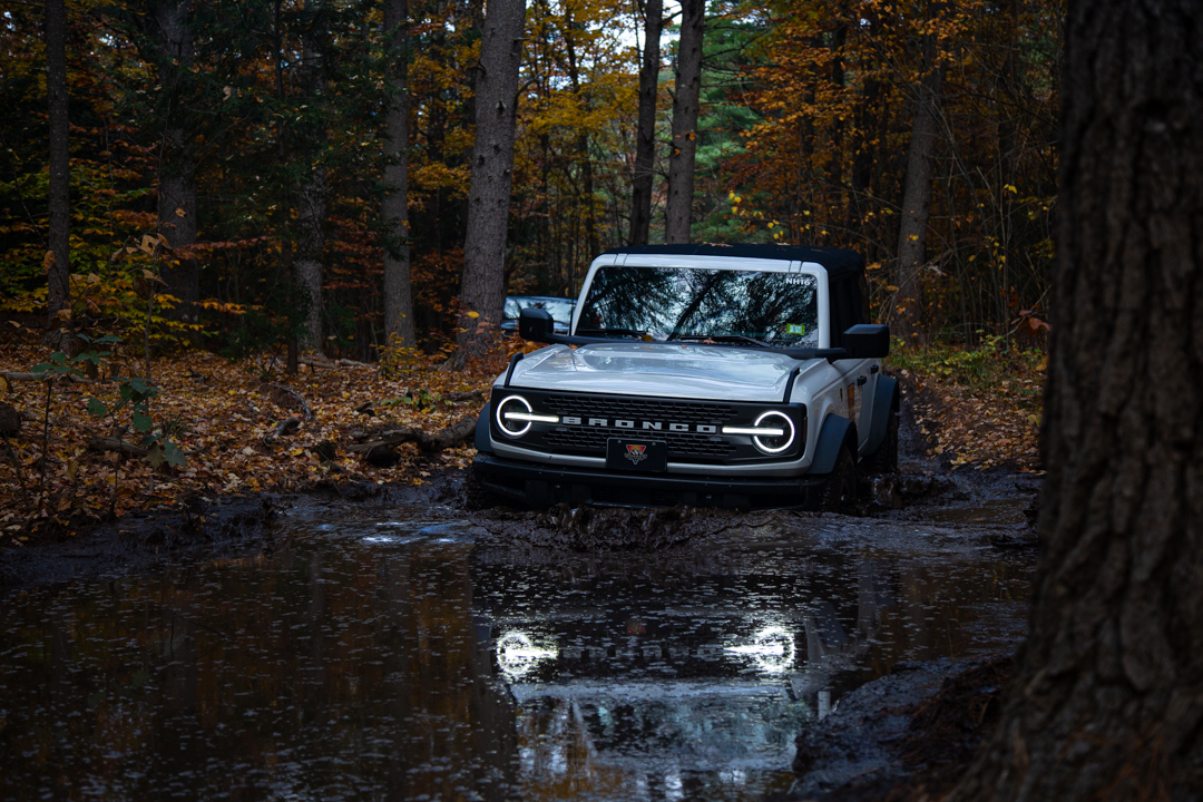 bronco driving through water