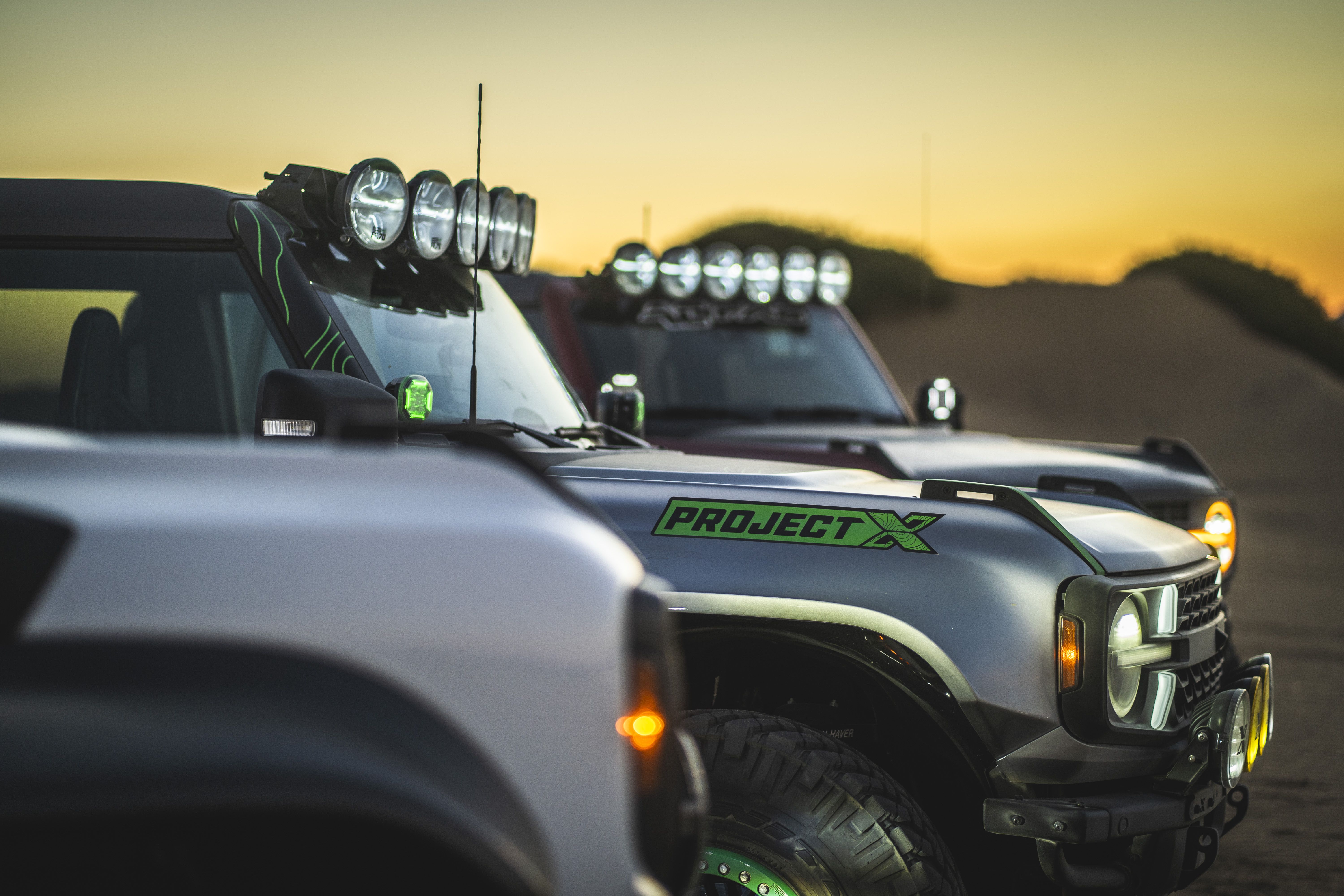 Ford Bronco with Project X lights on in desert