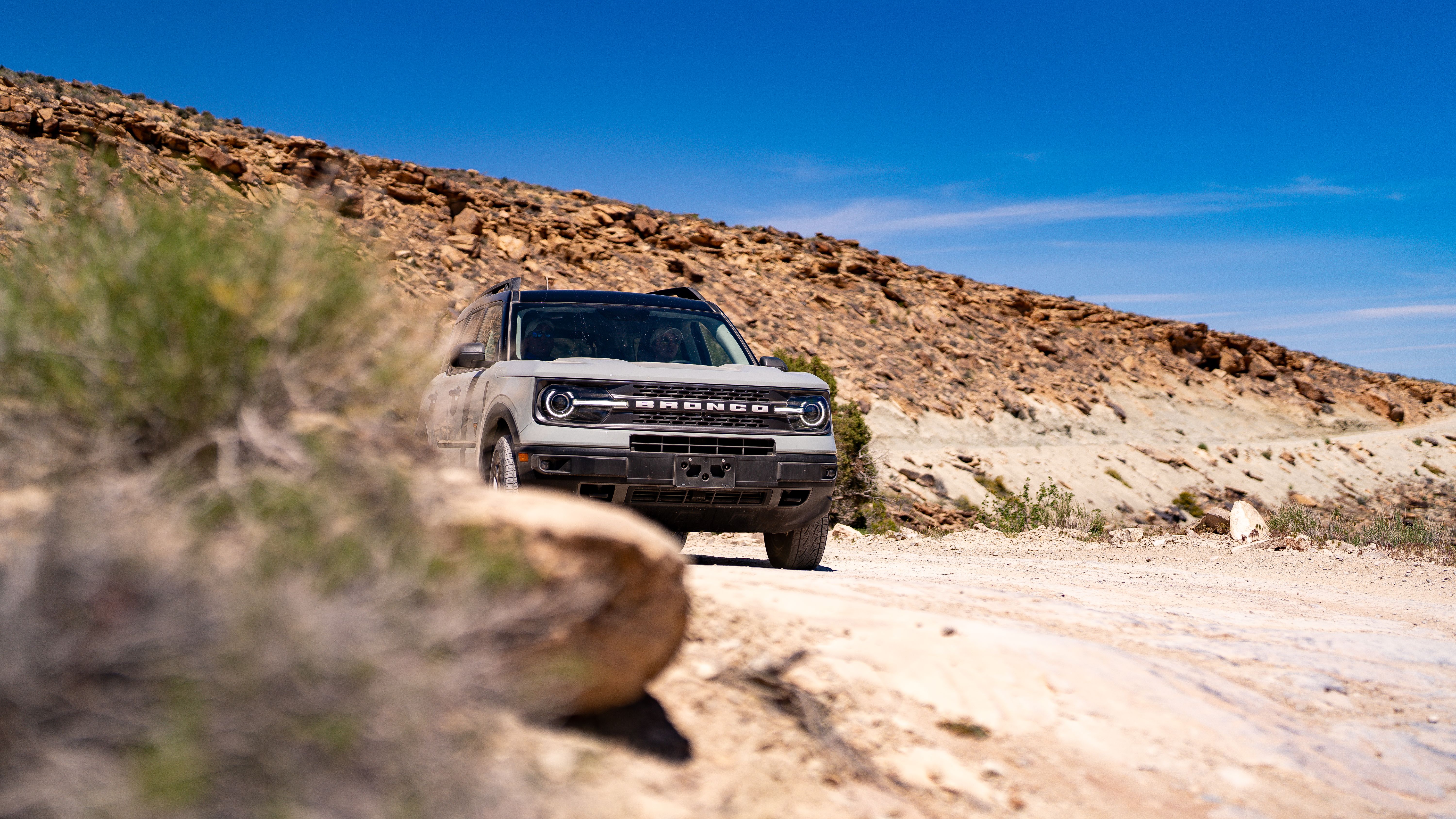 Bronco Sport driving on desert trail