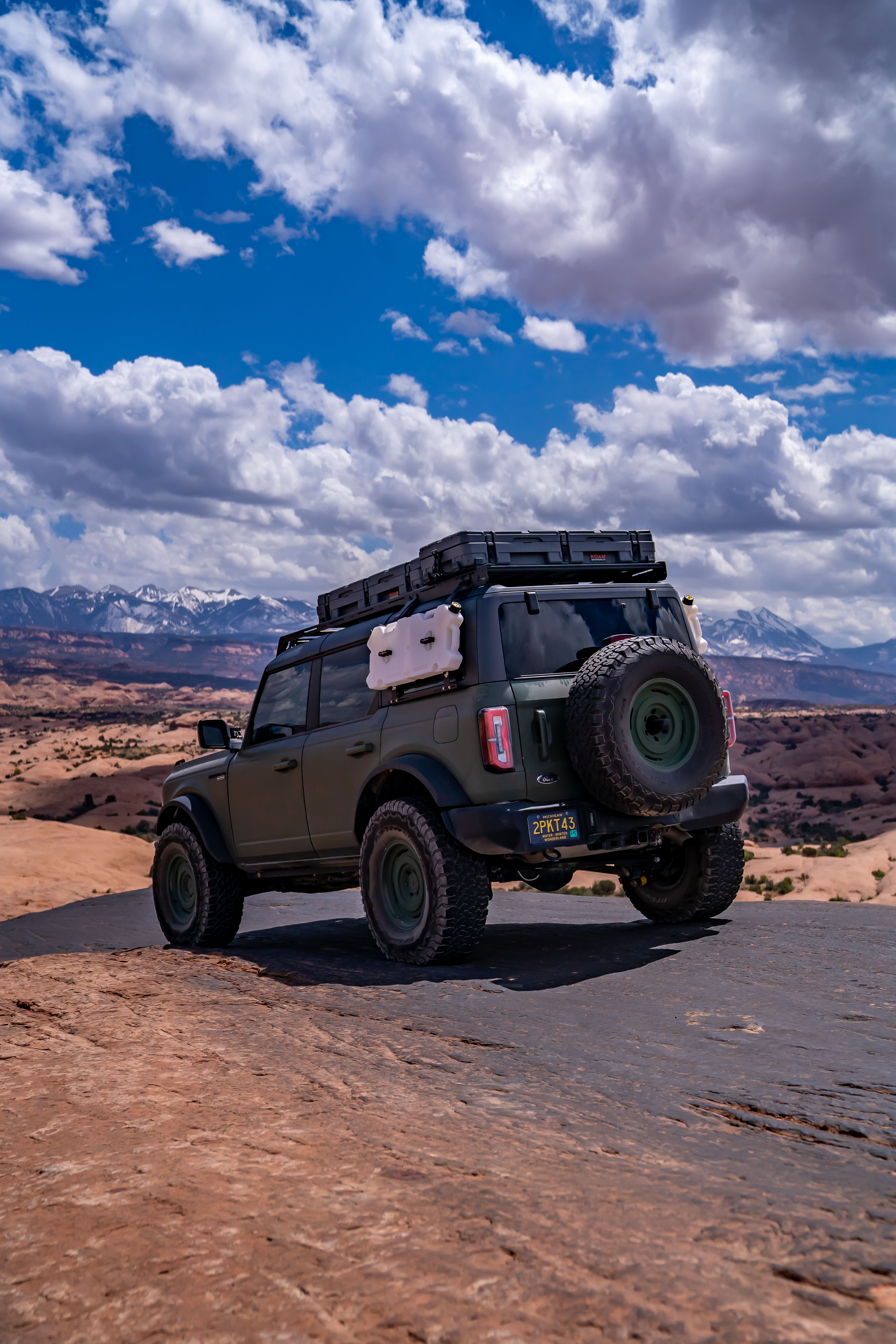 ford bronco driving on trail