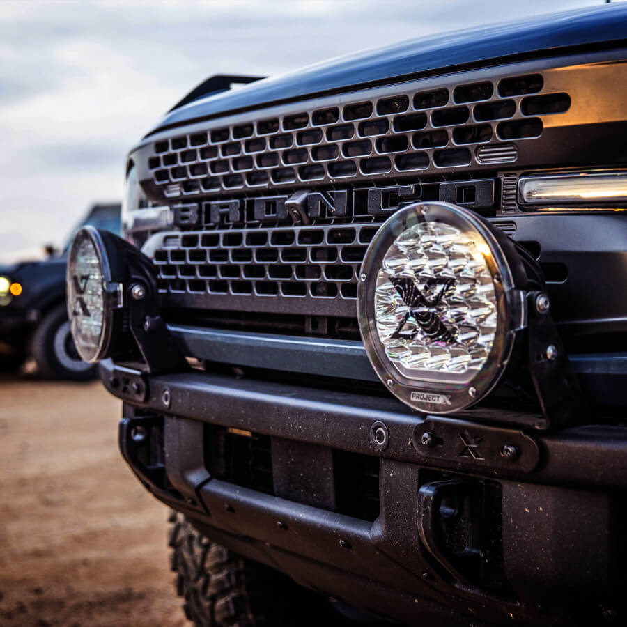lights mounted to front bumer of Ford Bronco