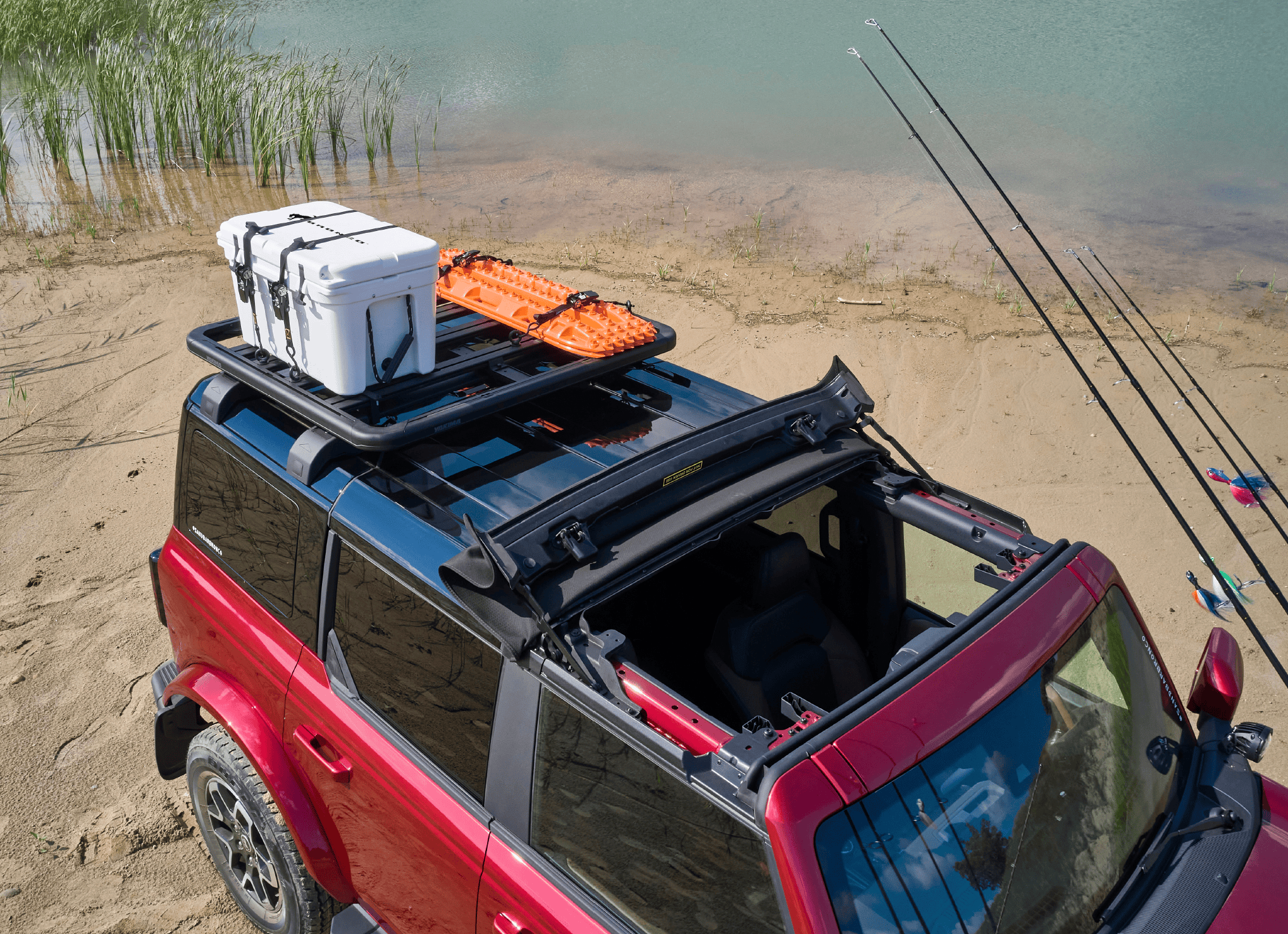 yeti strapped to the top of a ford Bronco